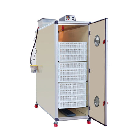 Hatching Time Cimuka. T2400H can be seen with door open to show racks full of hatching baskets. 10 hatching baskets can be seen on front racks. Digital control can be seen on top of incubator. Water reservoir tank can be seen behind incubator digital controls and connected to Humisonic humidifier.