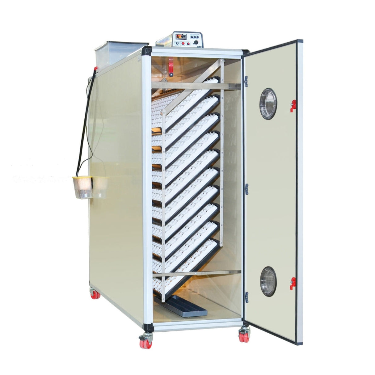Hatching Time Cimuka. T2400S image shows incubator with open door with setting trays inside. Humidity Tray can be seen on floor of incubator. Digital control on top of incubator is in front of water reservoir tank connected to Humisonic Humidifier.