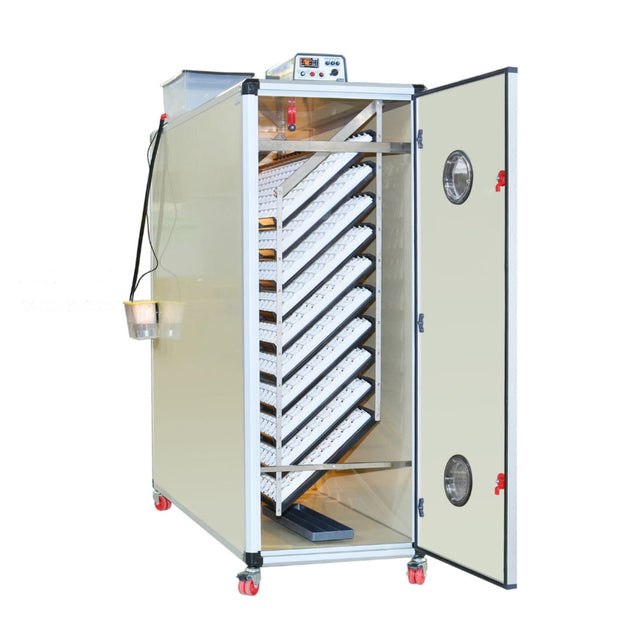 Hatching Time Cimuka. T2400S image shows incubator with open door with setting trays inside. Humidity Tray can be seen on floor of incubator. Digital control on top of incubator is in front of water reservoir tank connected to Humisonic Humidifier.