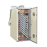 Hatching Time Cimuka. T2400SH Incubator can be seen with door open to capacity of incubator. Digital control can be seen on top of incubator. Water reservoir tank can be seen behind control and connected to Humisonic humidifier.