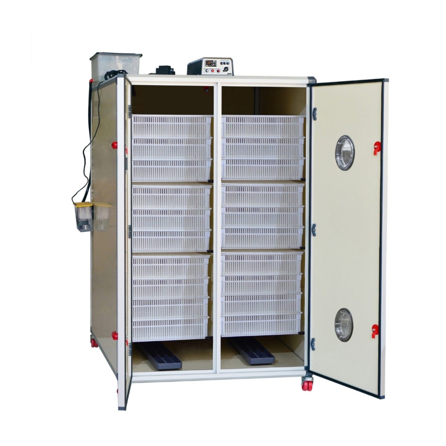 Hatching Time Cimuka. Incubator with doors open can be seen with 20 hatching baskets seen inside. Humidity tray can be seen on inside floor of incubator. Digital control on top of incubator is visible. Water reservoir tank can be seen on top of incubator connected to Humisonic humidifier on side of Incubator.